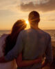Sweet-couple-enjoying-the-sunset-Stock-Photo-01